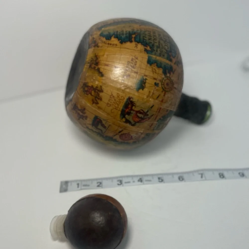 Vintage leather covered globe decanter. Made in Italy.